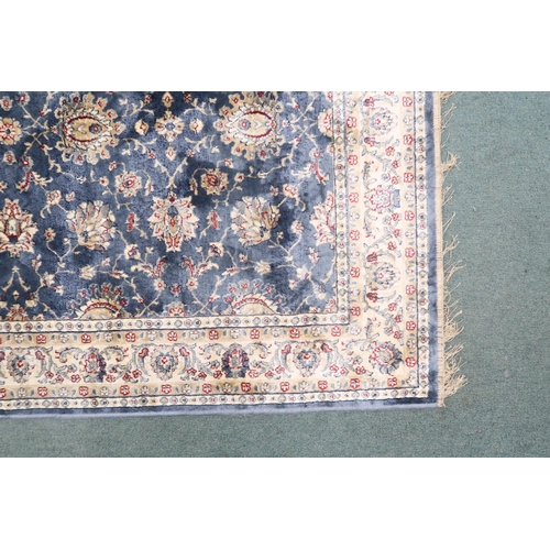 73 - A duck egg blue full pile kashmir Zeigler rug with all over floral patterned design within ivory flo... 