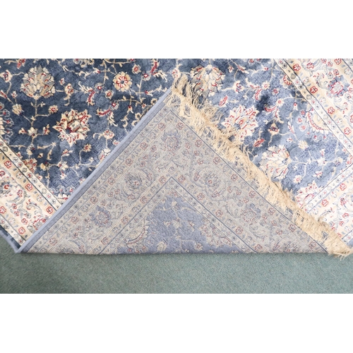 73 - A duck egg blue full pile kashmir Zeigler rug with all over floral patterned design within ivory flo... 