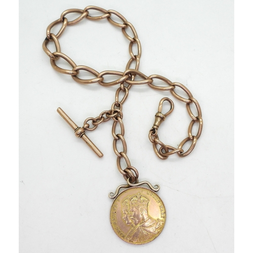 741 - A 9ct rose gold tapered elongated curb chain fob, length 32.5cm, with a George V, Coronation year Ag... 