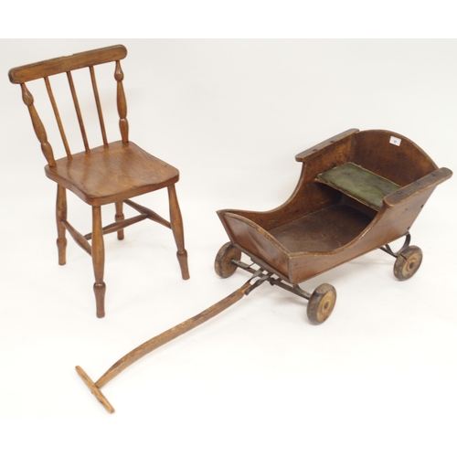 85 - A lot comprising a 19th century elm children's pull along buggy with leather seat, 42cm high x 42cm ... 