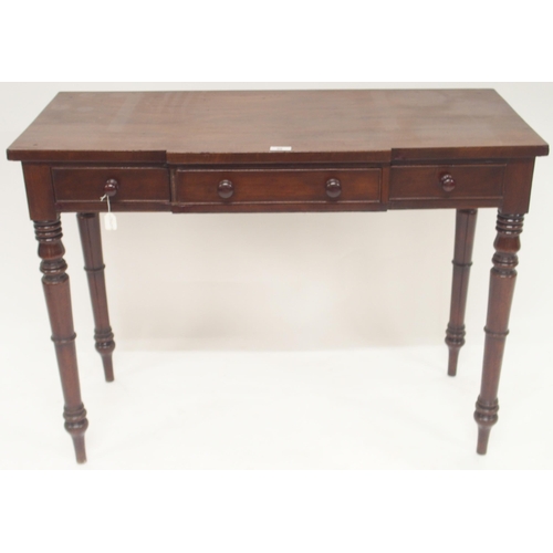 96 - A 20th century mahogany breakfront three drawer hall table on turned supports, 75cm high x 102cm wid... 