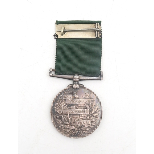 311 - A Victorian Volunteer Long Service Medal, awarded to 7030 Sergt. C. Rowland 3rd V.B. Royal Welsh Fus... 