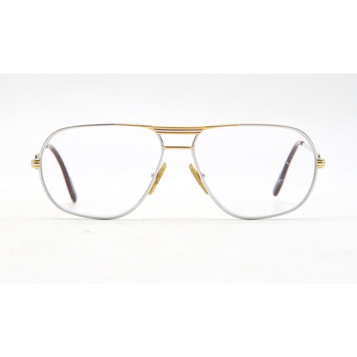 325 - A pair of Cartier glasses, dated 1988, numbered 59 14 to the bridge, the temples marked 