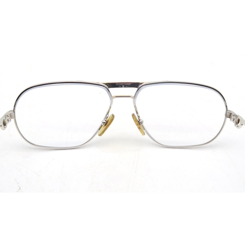 325 - A pair of Cartier glasses, dated 1988, numbered 59 14 to the bridge, the temples marked 