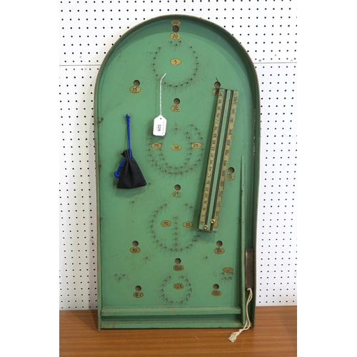 329 - A vintage bagatelle board, painted in green and gold, measuring approx. 76cm in height, with coordin... 