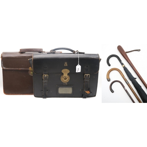 332 - Two leather briefcases, each embossed with Elizabeth II royal cipher; together with one other; two s... 