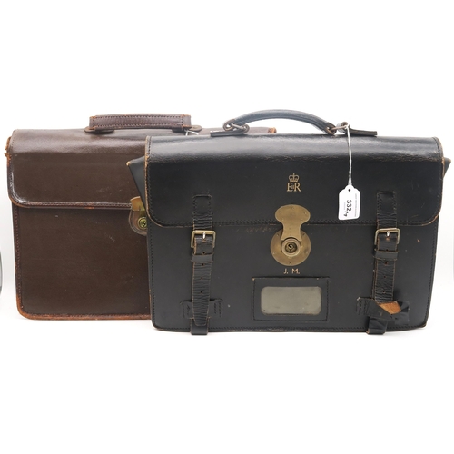 332 - Two leather briefcases, each embossed with Elizabeth II royal cipher; together with one other; two s... 