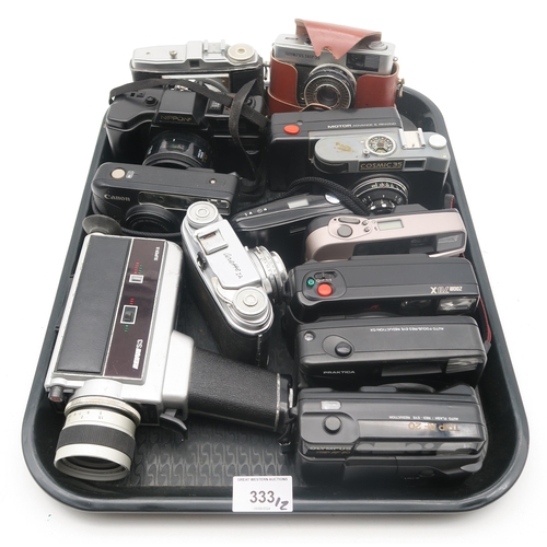 333 - A collection of vintage cameras, to  include a Revue S3 Super 8 camera, two Olympus DX cameras,... 