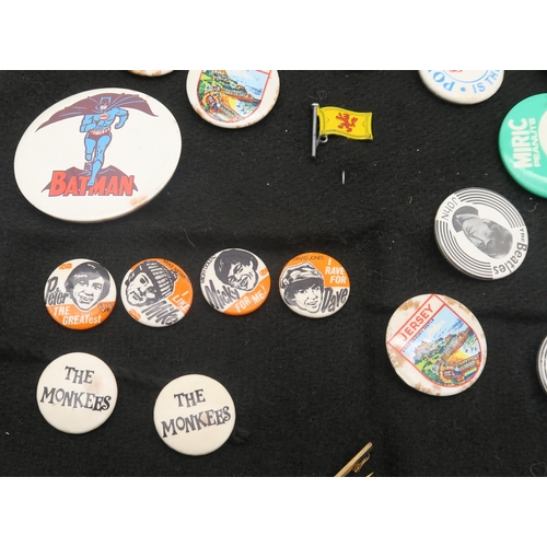 334 - A collection of vintage pin badges, to include Beatles and Monkees examples, together with a further... 