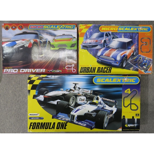 344 - A Scalextric Formula 1 set and two Micro Scalextric sets: Pro Driver and Urban Racer (3)