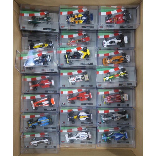 401 - A large quantity of Formula 1: The Car Collection model vehicles, produced by Panini Collections, wi... 