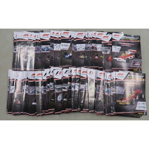 401 - A large quantity of Formula 1: The Car Collection model vehicles, produced by Panini Collections, wi... 