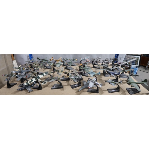 406 - A quantity of Fighter Aircraft Collection die-cast model military aeroplanes, with various accompany... 