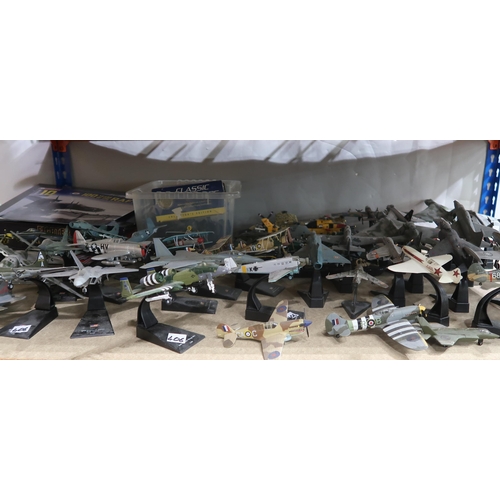 406 - A quantity of Fighter Aircraft Collection die-cast model military aeroplanes, with various accompany... 