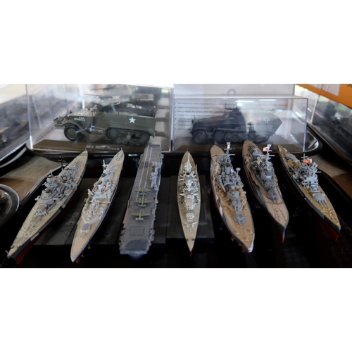 407 - A large quantity of Combat Tanks Collection scale model vehicles, with accompanying magazines publis... 