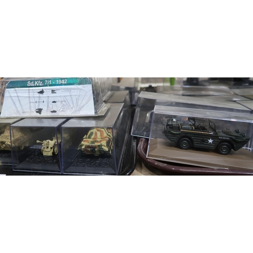 407 - A large quantity of Combat Tanks Collection scale model vehicles, with accompanying magazines publis... 