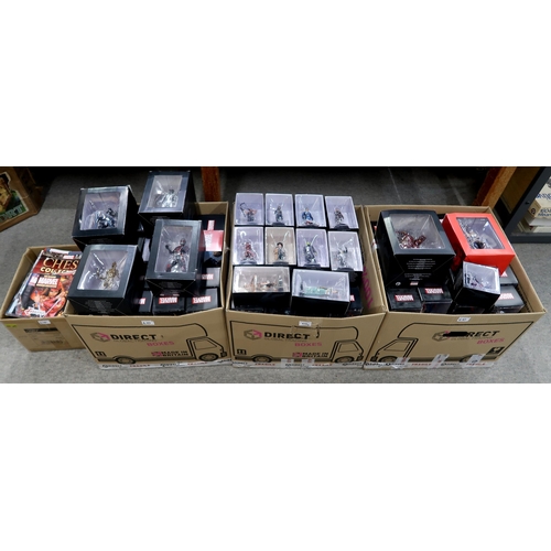 410 - A large quantity of boxed Marvel Movie Collection superhero figurines produced by Eaglemoss Publicat... 