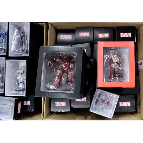 410 - A large quantity of boxed Marvel Movie Collection superhero figurines produced by Eaglemoss Publicat... 