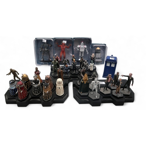 411 - A quantity of BBC Doctor Who Collection figurines, with stepped display bases and accompanying magaz... 