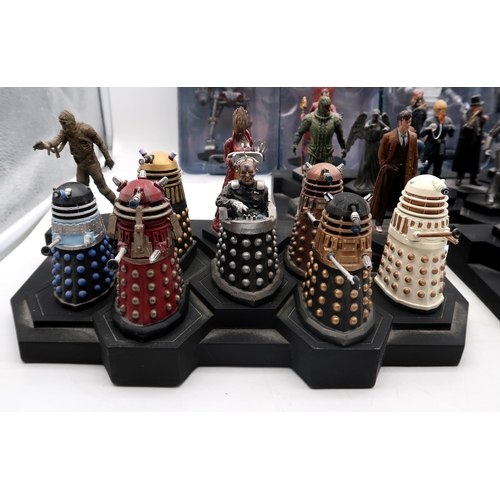 411 - A quantity of BBC Doctor Who Collection figurines, with stepped display bases and accompanying magaz... 