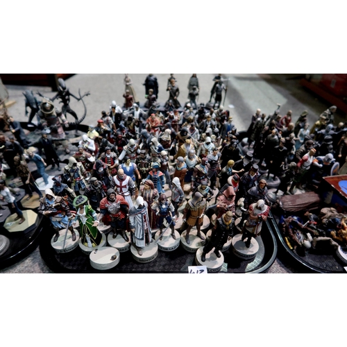 412 - A large quantity of HBO Games of Thrones, Walking Dead and Assassin's Creed resin figurines, with ac... 