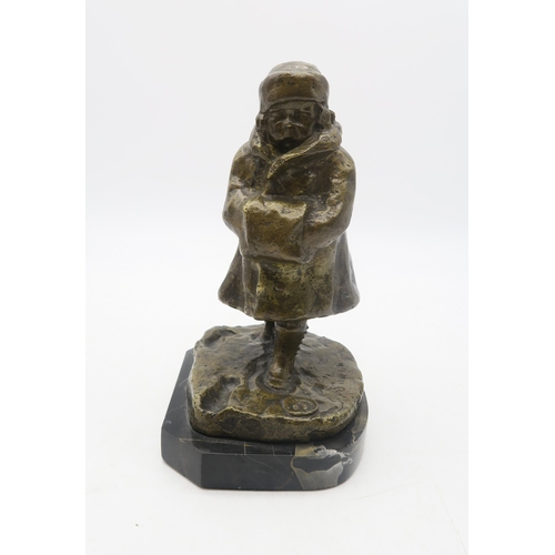 165 - A bronzed metal figure of a small girl in winter coat