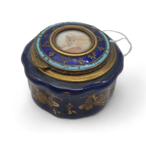 171 - A 19th century porcelain pill box, with enamelled brass lid and portrait of a lady