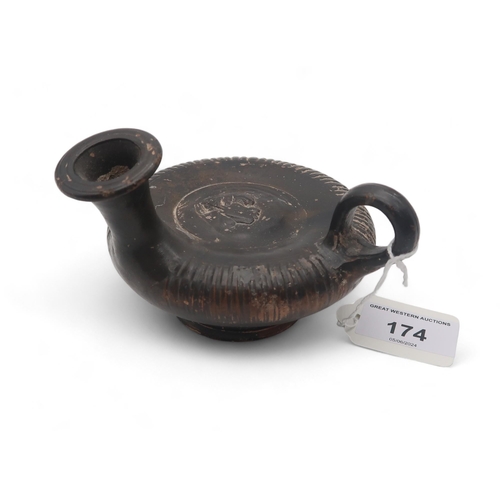 174 - Ancient Greek Calene ware guttos,  3rd century BCE fired and stamped terracotta, black-glazed w... 