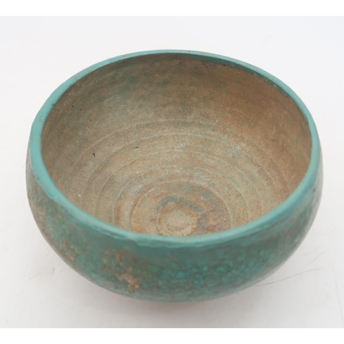 175 - A Persian bowl, turquoise glazed, possibly Kashan 13th century, 14cm diameter