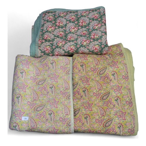 179 - Three chintz bed covers