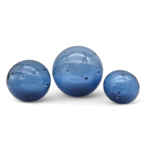 200 - Three blue glass Iittala 1960's solar sun balls designed by Timo Sarpeneva, the hand blown spheres w... 