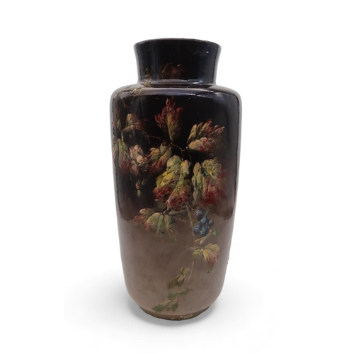 203 - A Montigny-sur-Loing faience vase, decorated with brambles, initialled to base G.L. and D.X