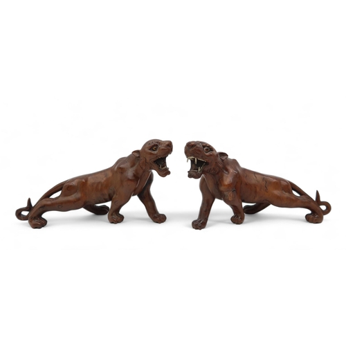 207 - A pair of Japanese wooden models of tigers