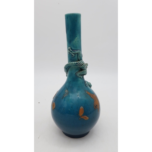 208 - A Japanese Awaji turquoise glazed bottle vase, with lacquer decoration to the body