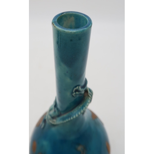 208 - A Japanese Awaji turquoise glazed bottle vase, with lacquer decoration to the body