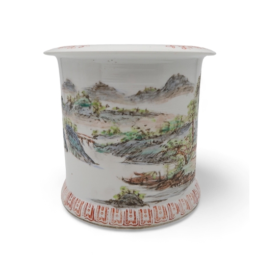 209 - A Chinese famille verte brush pot painted with a mountainous scene, red six character mark to base