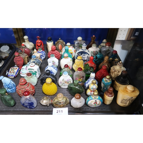 211 - A large quantity of snuff bottles, including glass, porcelain, bone, metal and carved stone, togethe... 