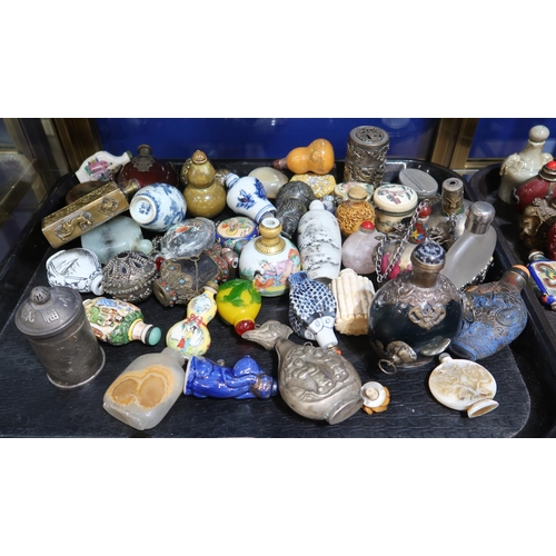 211 - A large quantity of snuff bottles, including glass, porcelain, bone, metal and carved stone, togethe... 