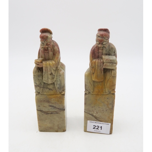 221 - A pair of carved soapstone figures