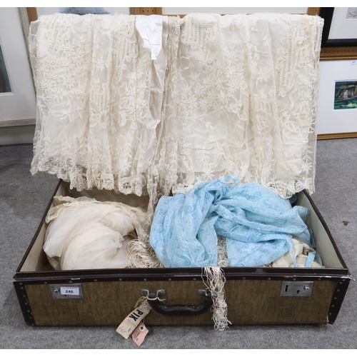 246 - A cream piano shawl embroidered with peonies, lace covered skirt and cape, veil etc