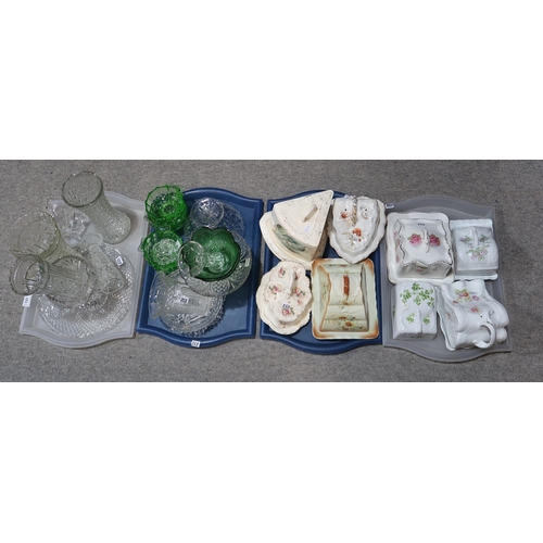 253 - A group of decorative ceramic cheese dishes and covers and assorted pressed glass