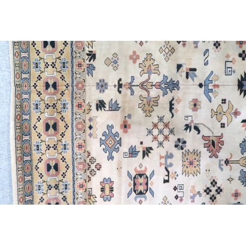 2137A - AN EXCEPTIONAL LARGE IVORY GROUND OUSHAK STYLE CARPET with all-over geometric patterned ground withi... 