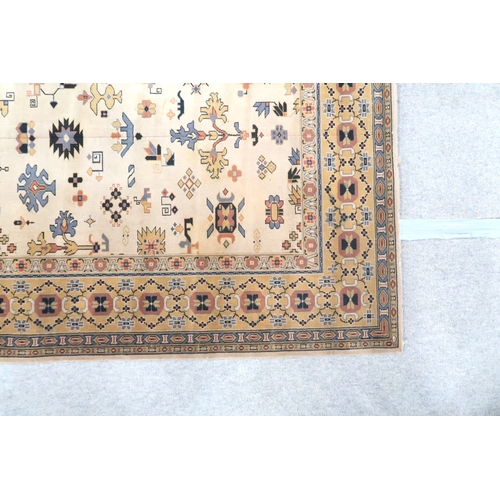 2137A - AN EXCEPTIONAL LARGE IVORY GROUND OUSHAK STYLE CARPET with all-over geometric patterned ground withi... 