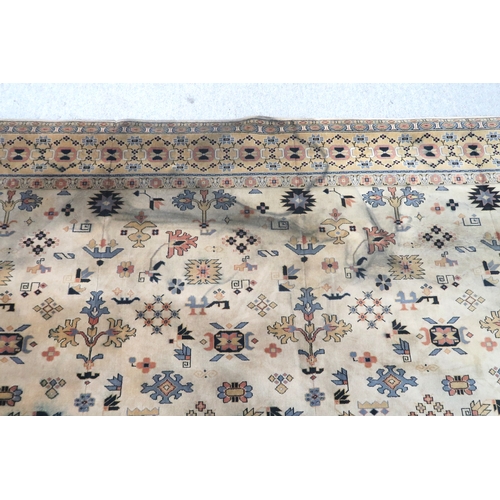 2137A - AN EXCEPTIONAL LARGE IVORY GROUND OUSHAK STYLE CARPET with all-over geometric patterned ground withi... 