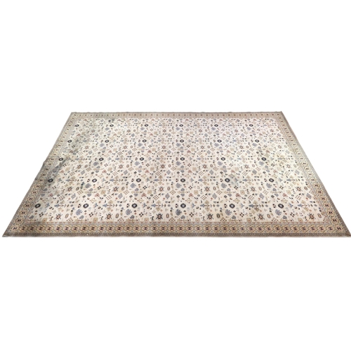 2137A - AN EXCEPTIONAL LARGE IVORY GROUND OUSHAK STYLE CARPET with all-over geometric patterned ground withi... 