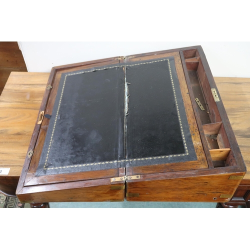 13 - A 19th century rosewood brass bound writing slope, 19cm high x 51cm wide x 26cm deep