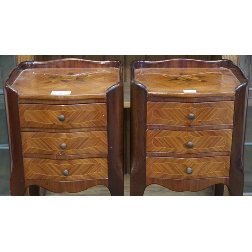 18 - A pair of 20th century continental three drawer side chests with floral inlaid top on cabriole suppo... 