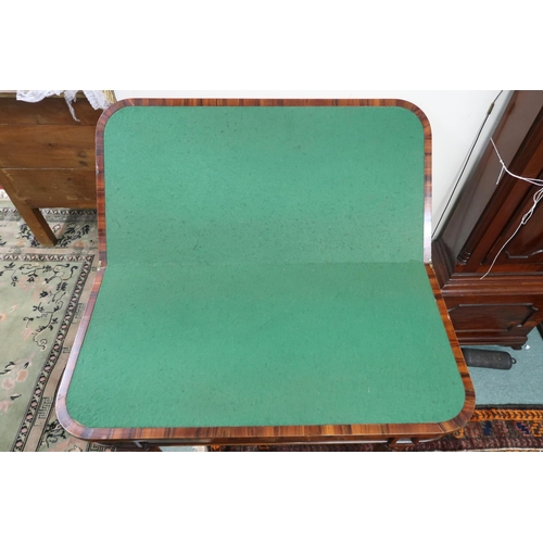 2 - A 19th century rosewood veneered fold-over card table with green felt play surface on turned foliate... 