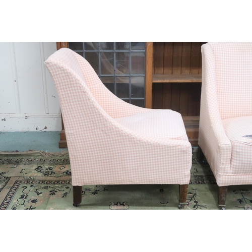 23 - A pair of 19th century open lounge chairs with checked upholstery on square tapering supports termin... 