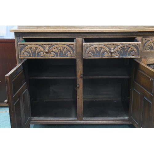 54 - A 20th century oak kitchen dresser with plate rack back with pair of central drawers on base with th... 